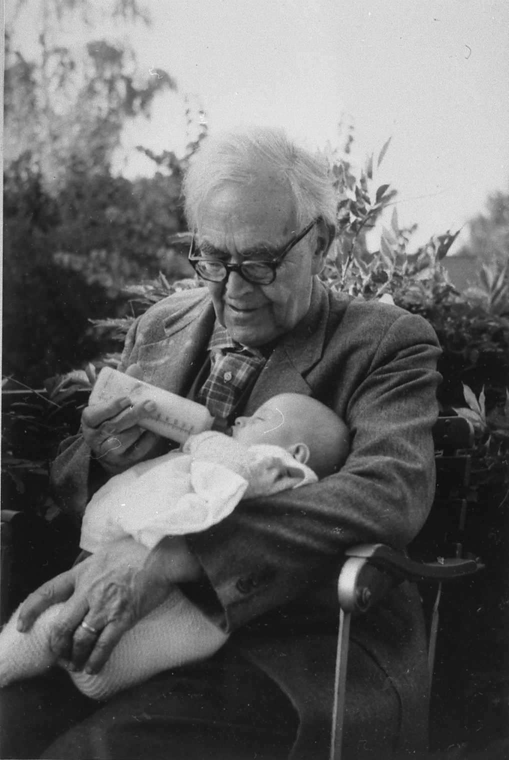 Karl Barth with his first great grandchild, Olivier Schopfer, in 1962.